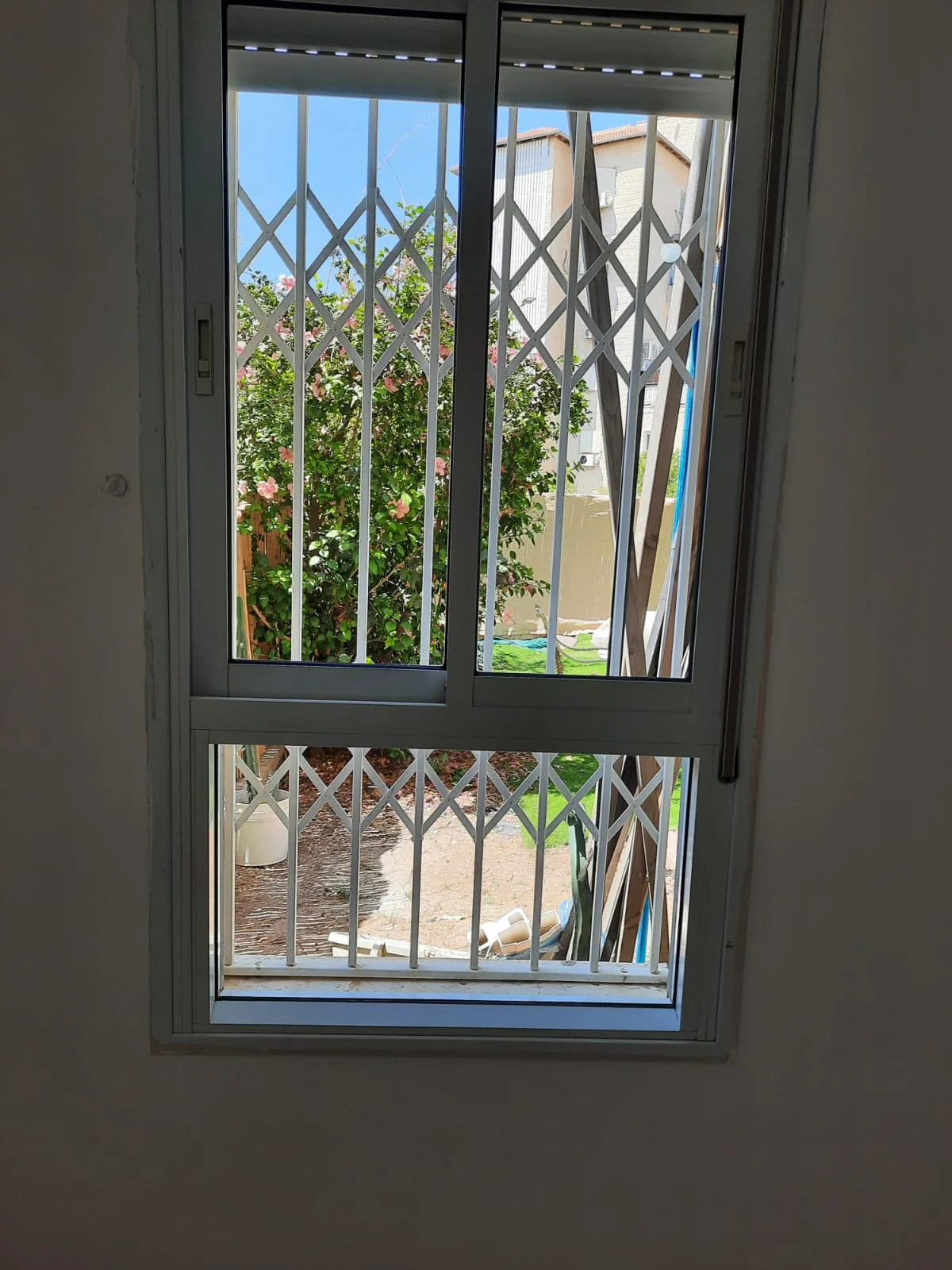 A cleaned window overlooking a garden
